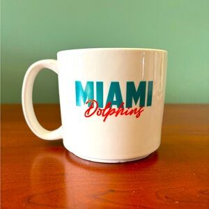 Miami Dolphins authentic NFL ceramic mug. Brand new, never used.